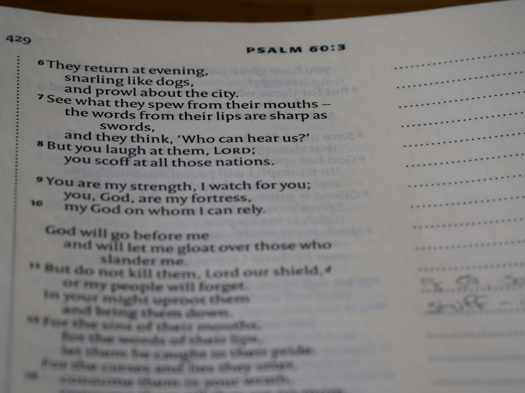 a close up of a book with a poem on it